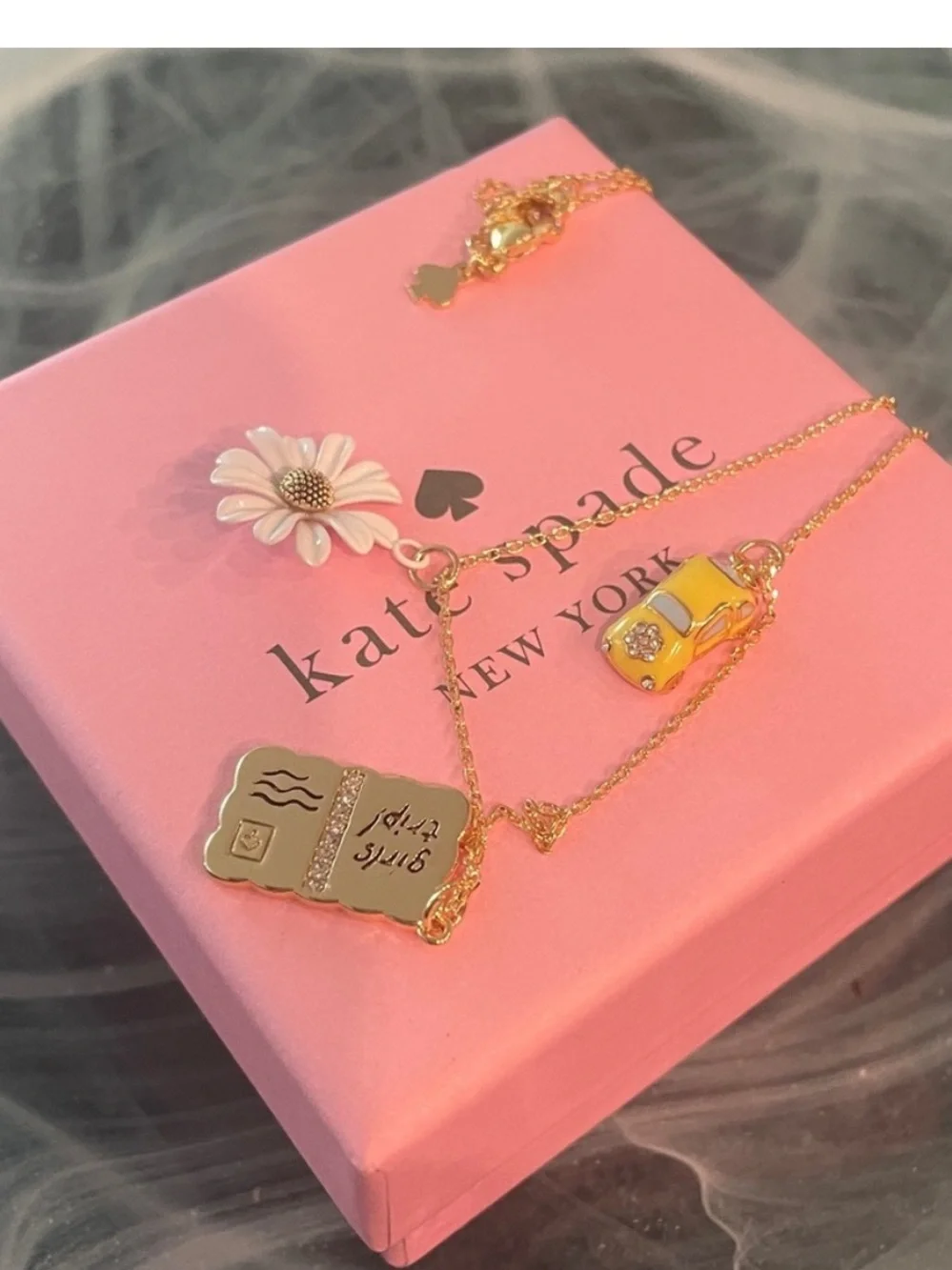 kate spade Gold Necklace with Yellow Taxi, White Daisy & Gold Book Charms